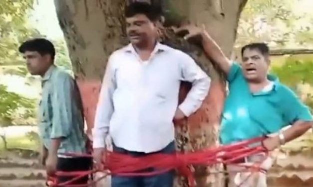 Video | Jharkhand Students in Uniforms Tie Teacher to Tree & Beat him Up for Failing Them