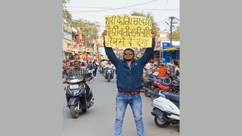 MP Man’s Quest for Bride with Govt Job Goes Viral, Holds Poster Saying “Will pay dowry”