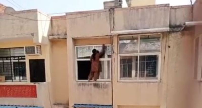Caught on Cam: Reckless Ghaziabad Woman Hangs From 4th Floor Balcony Railing to Clean Window Pane