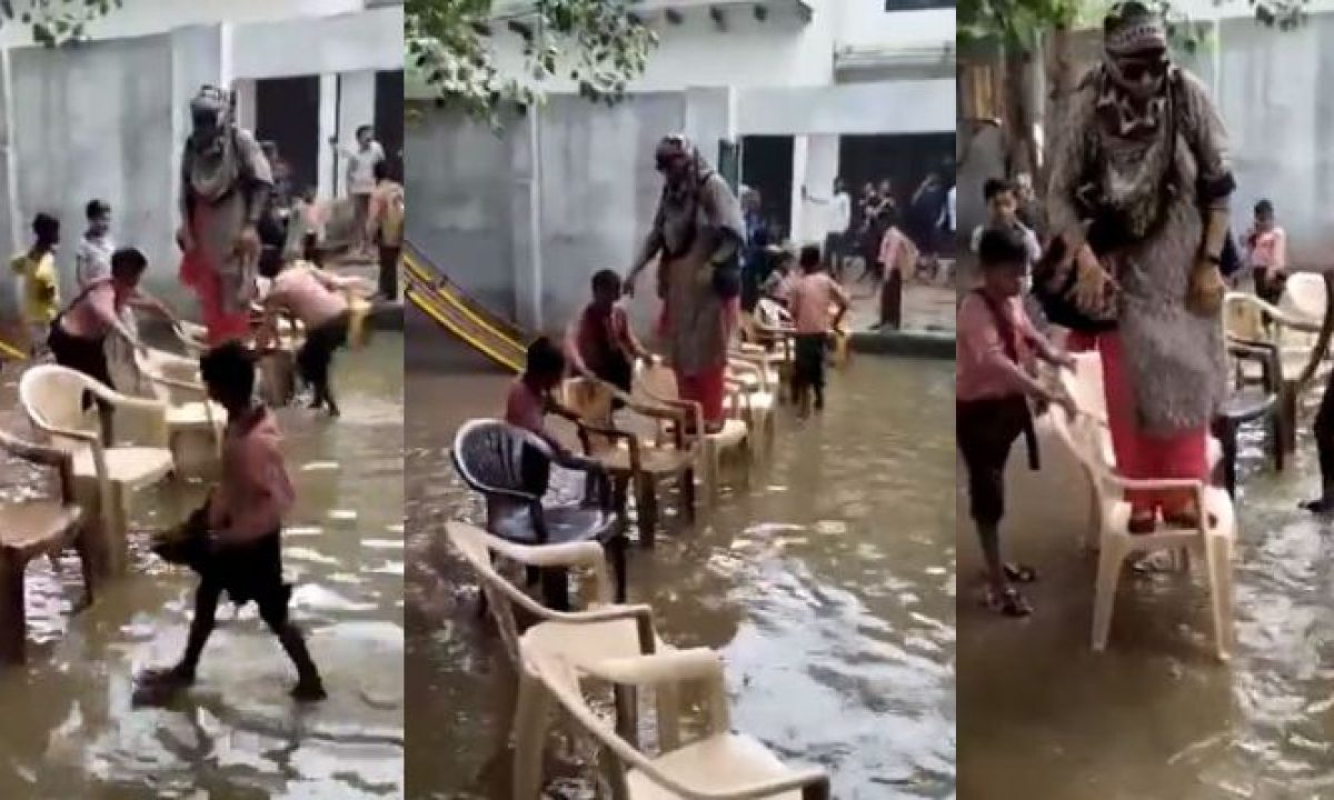 UP Teacher Enters School on “Bridge” Made of Chairs, MP School Students  Hold Umbrella as Roof Leaks | Shiksha News News