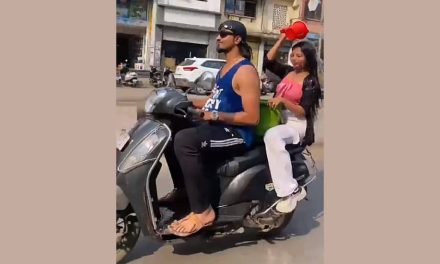 Maharashtra Couple Take Bath While Riding Scooter in a Bid to Go Viral, Police Registers Case | Video
